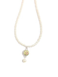 Pearl and Swarovski necklace with Swarovski crystal rivoli pendant in Yellow Green with Swarovski Pearl in Cream